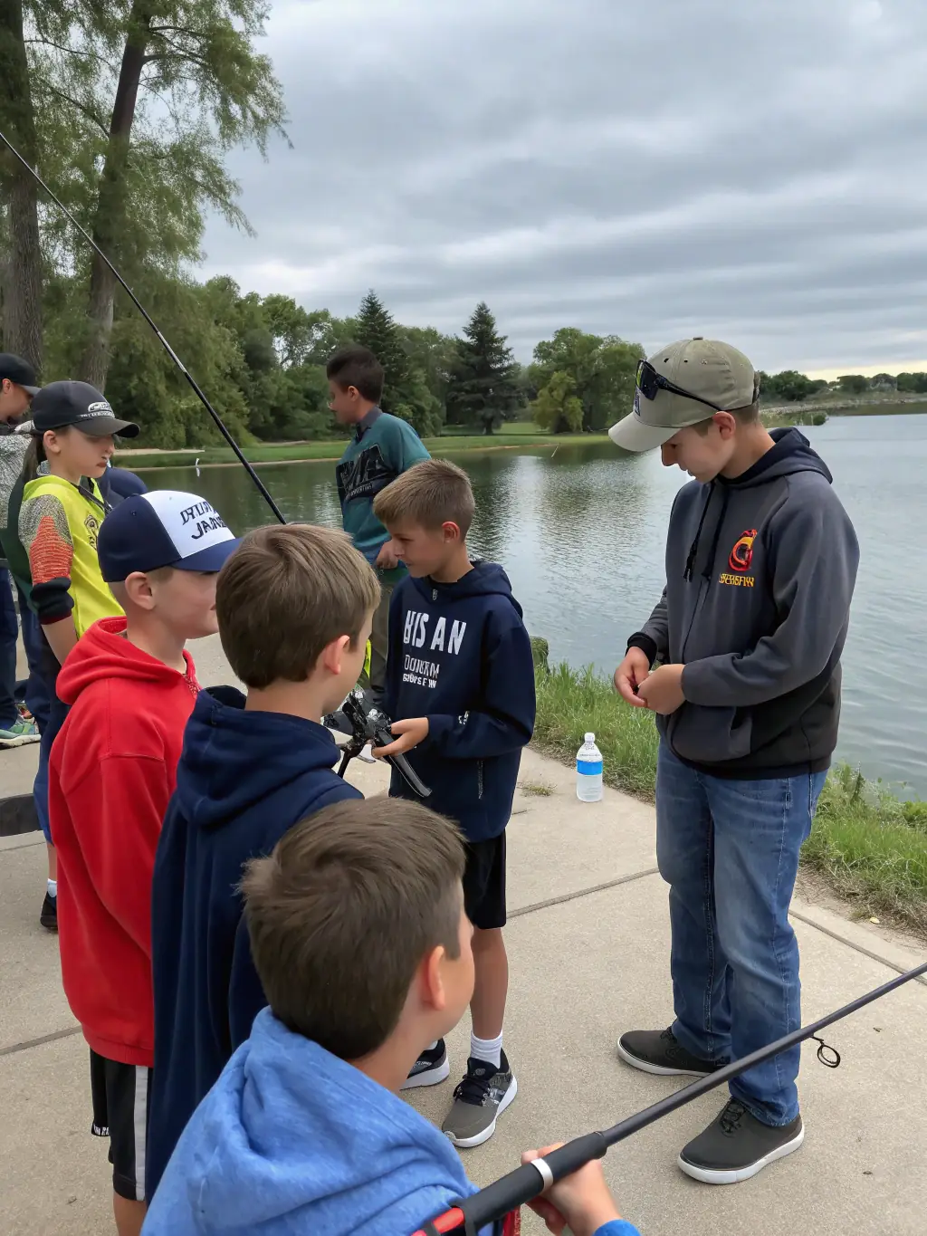 A photo of fly fishing training session, with participants learning casting techniques in a river.